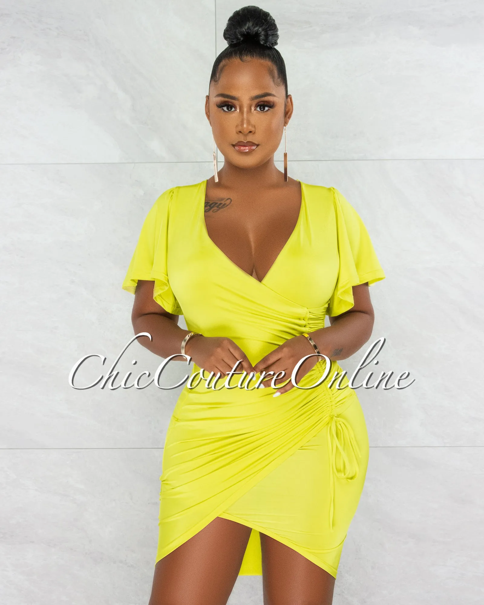 *Dalie Lime Wrap Ruched Side Midi Dress sold by Chic Couture