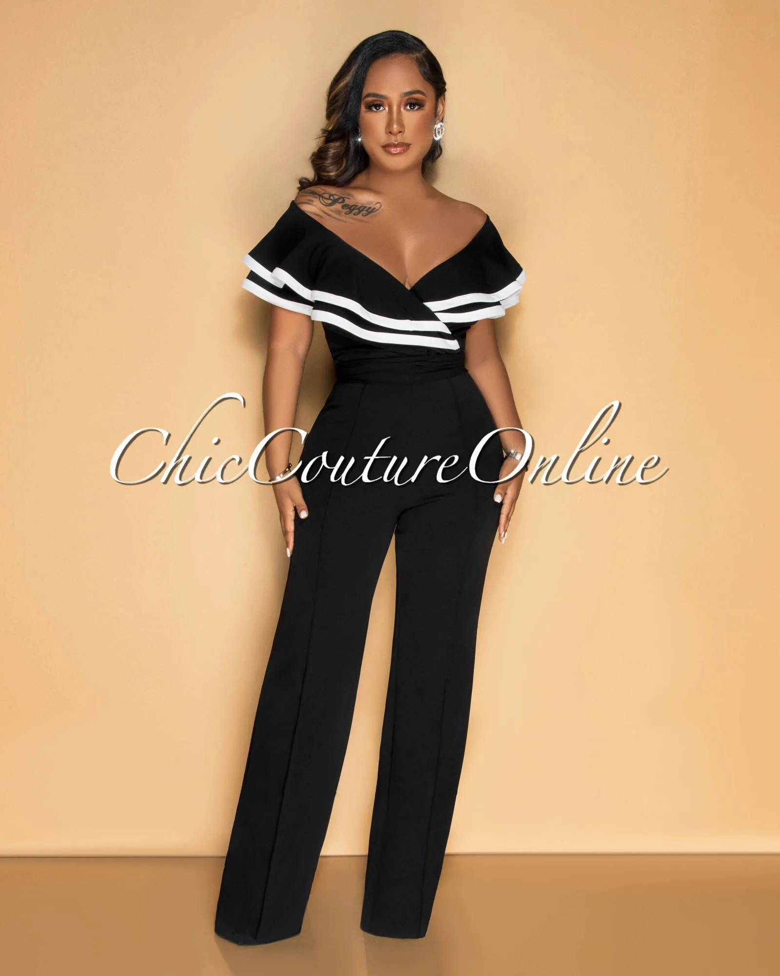 Mara Black White Trim Ruffle Bust Jumpsuit sold by Chic Couture