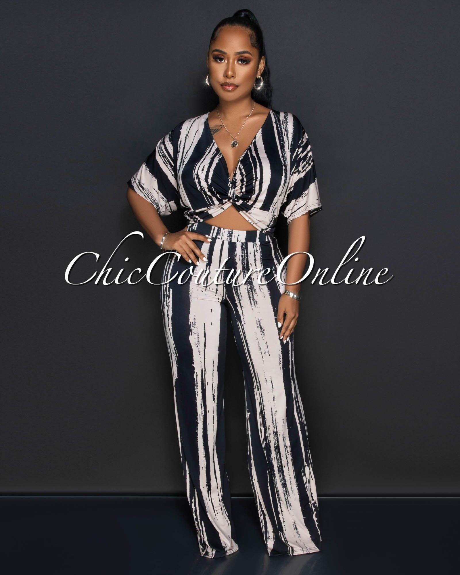 Elica Black Nude Print Waist Cut-Out Jumpsuit sold by chic
