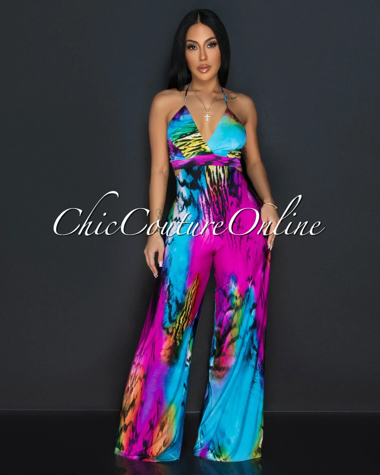 Hadya Fuchsia Turquoise Print Halter Cut-Out Jumpsuit sold by Chic Couture