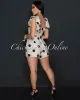 Lyra Black Beige Polka Dot Romper sold by Chic Couture