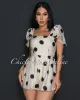Lyra Black Beige Polka Dot Romper sold by Chic Couture