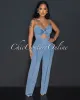 Velicia Light Denim Bust Knot Jumpsuit sold by Chic Couture