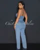 Velicia Light Denim Bust Knot Jumpsuit sold by Chic Couture