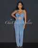 Velicia Light Denim Bust Knot Jumpsuit sold by Chic Couture