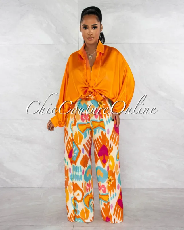 *Jennia Orange Multi-Color Print Linen Pants sold by Chic Couture