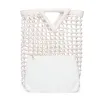 Avalon Woven Fold-Over Clutch sold by Chinese Laundry