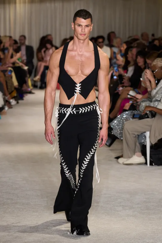 Black Vest with White Lace Up sold by Christian Siriano