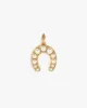 Pearl Horseshoe Charm sold by Clare Vivier