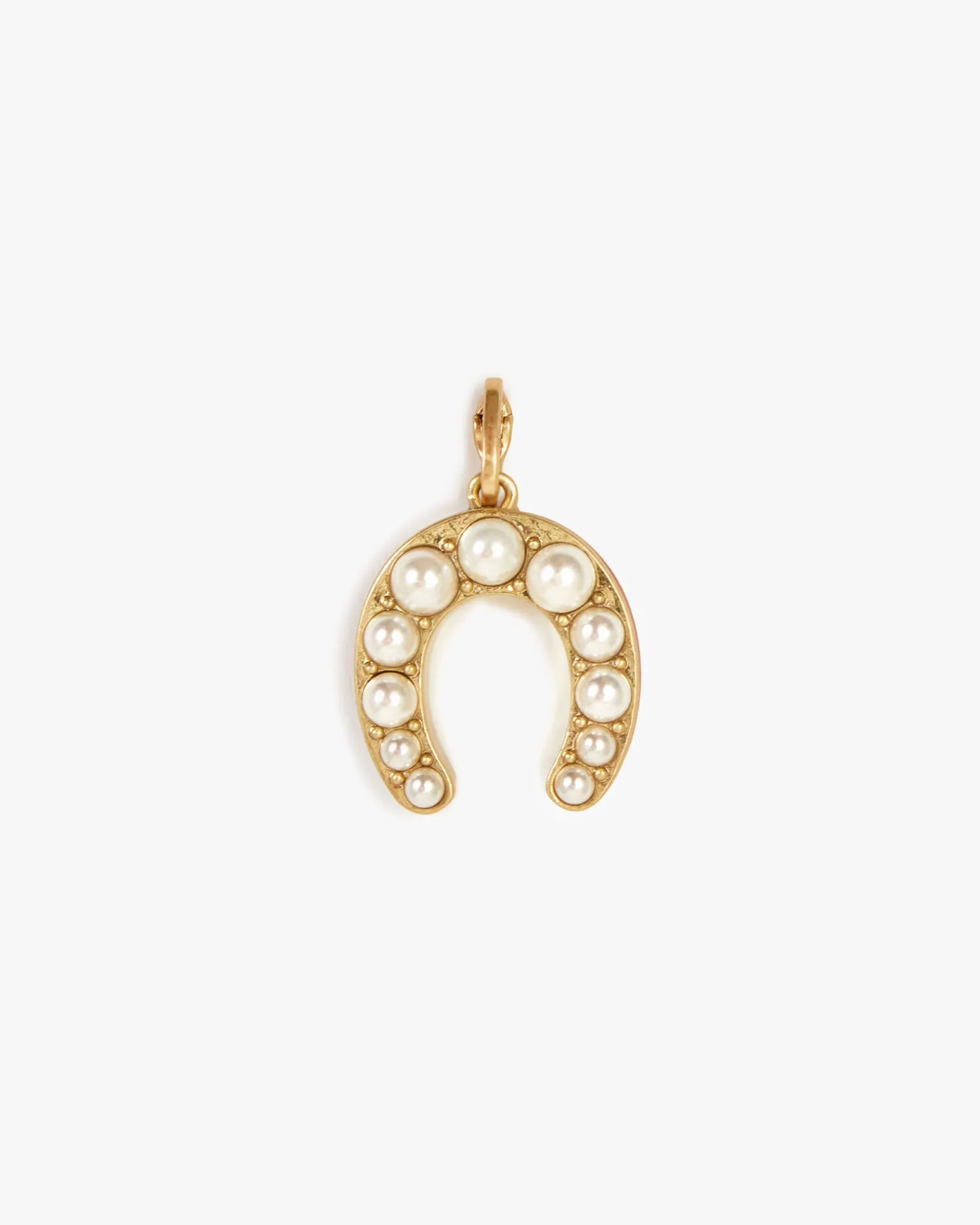 Pearl Horseshoe Charm sold by Clare Vivier