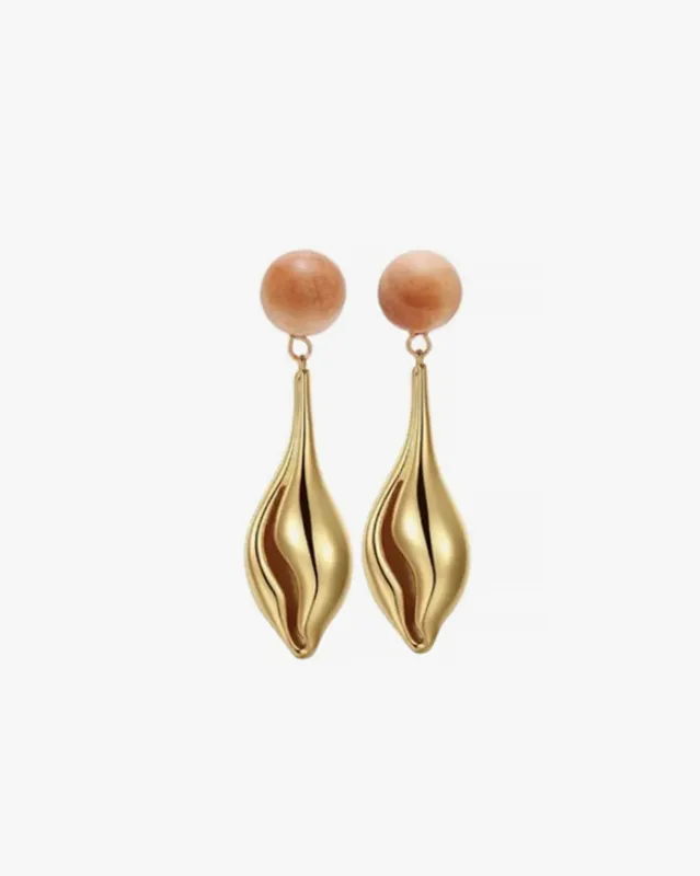 Gold Nautilus Earrings sold by Clare Vivier
