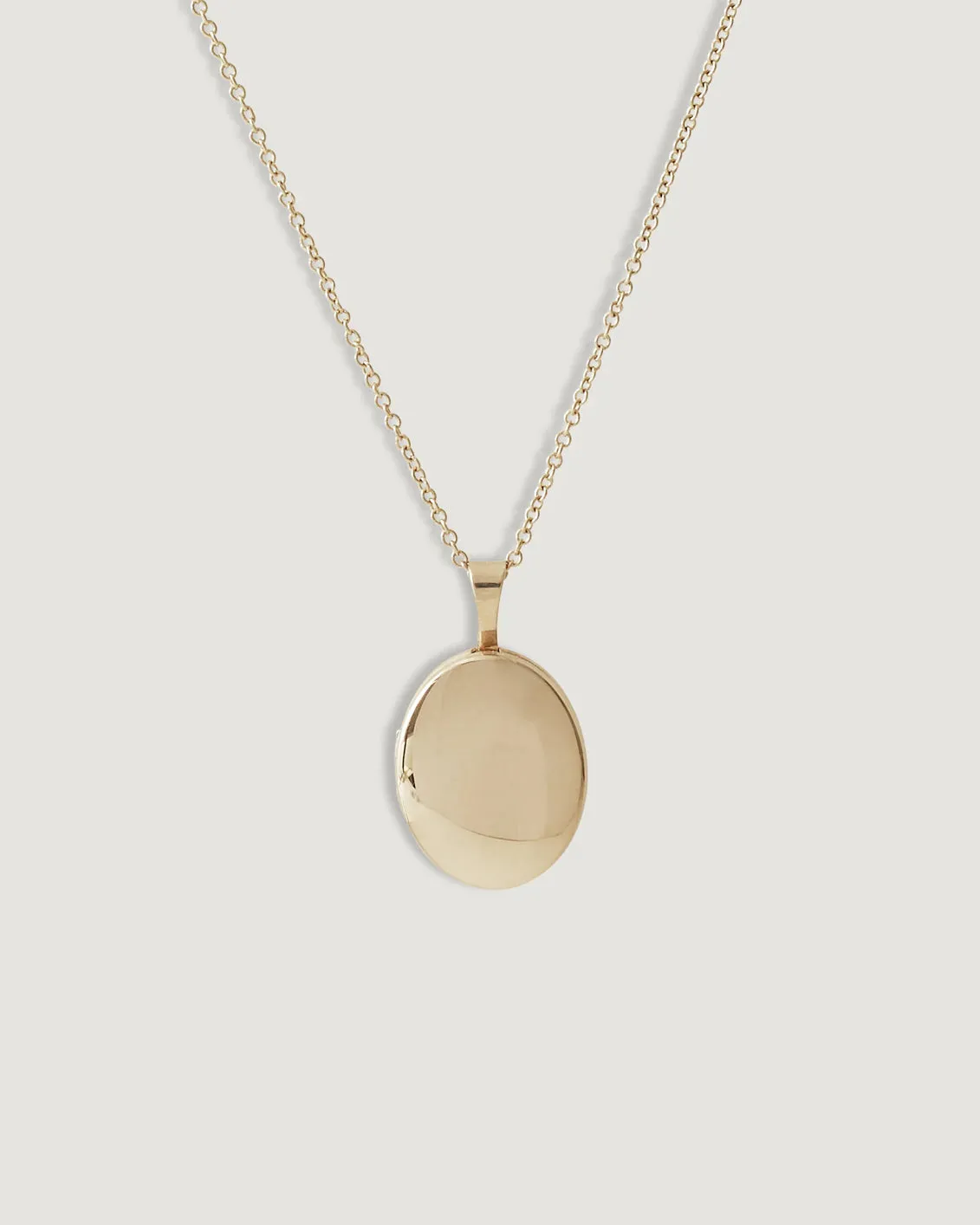Maison Oval Locket Necklace sold by Clare Vivier