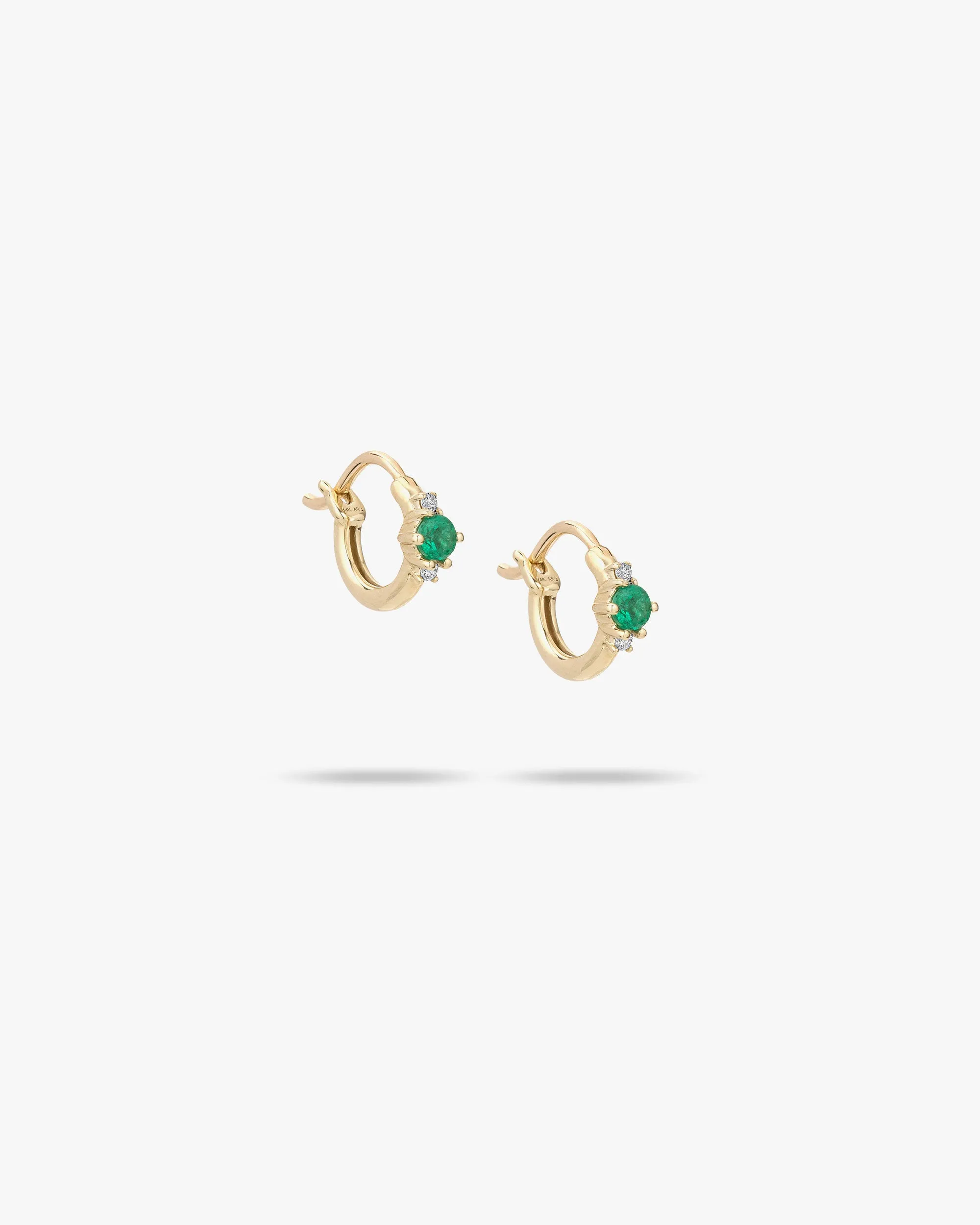 Emerald & Diamond Trio Huggie Hoops sold by Clare Vivier