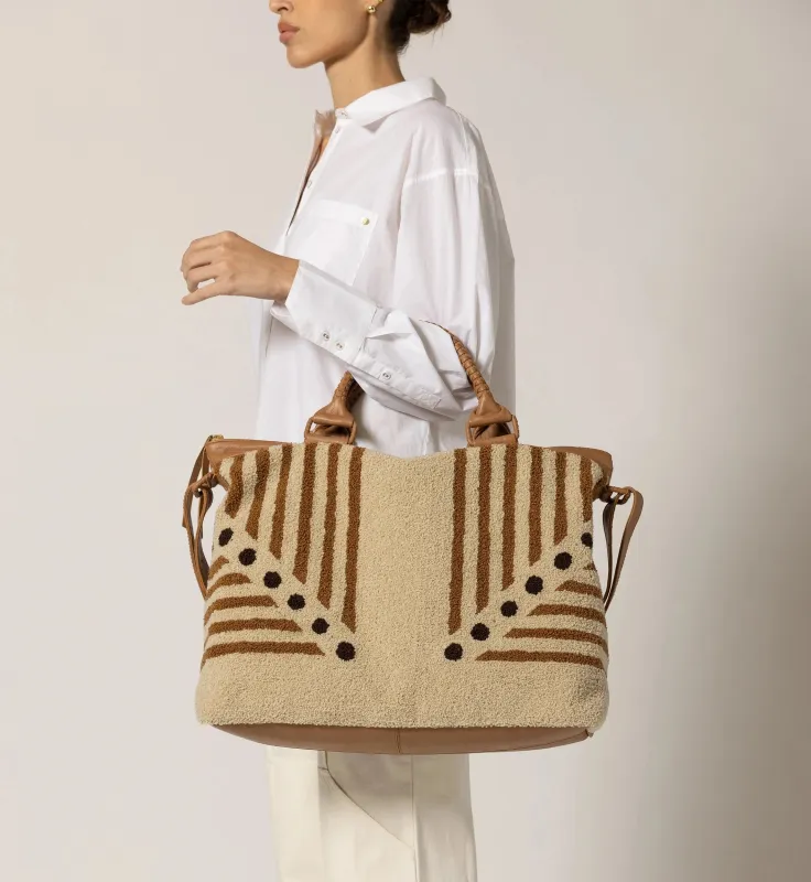 Lusso Stripe Weekender sold by Cleobella