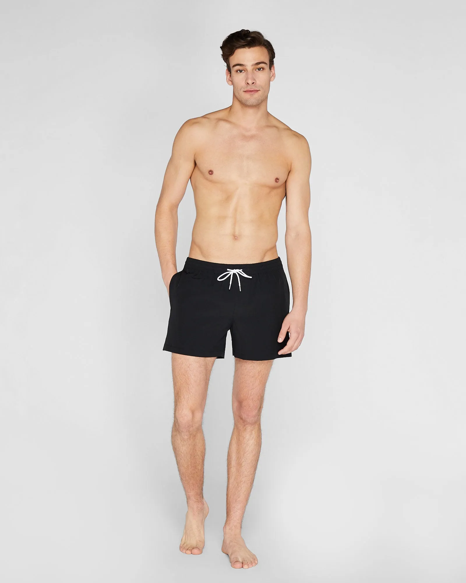 Arlen Solid 4" Swim Trunk sold by Club Monaco