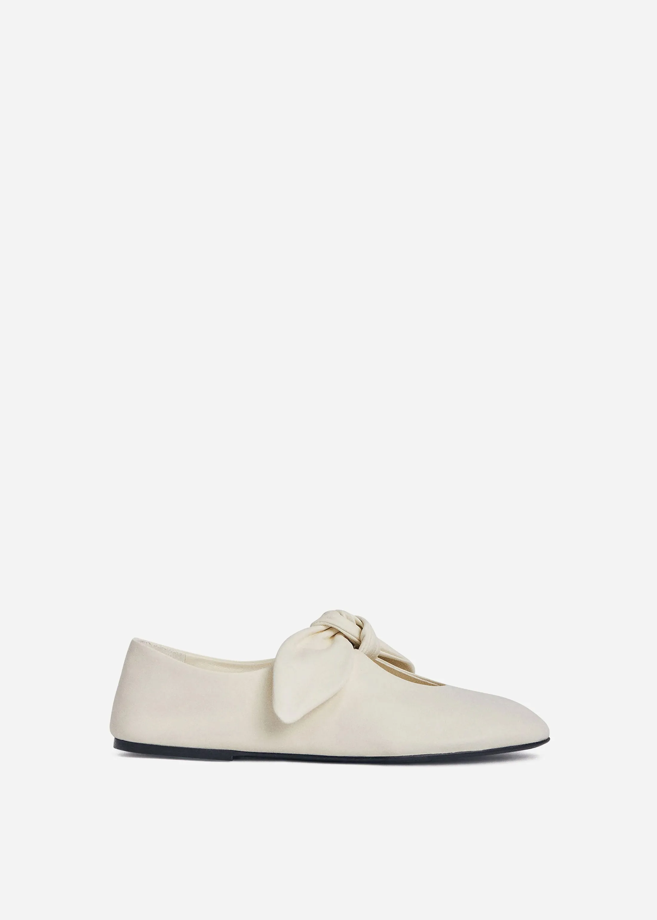 Leather Bow Flat in Ivory sold by CO