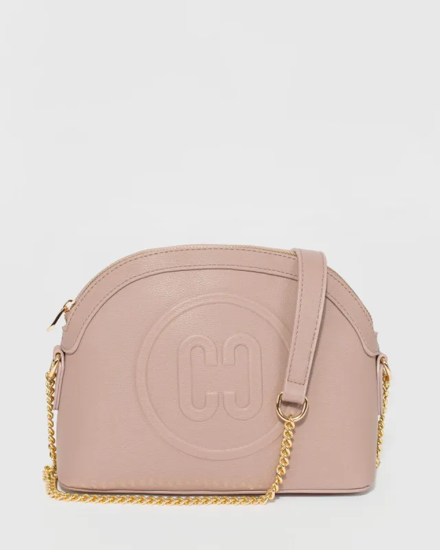 Taupe Raina Embossed Crossbody Bag sold by Collete Hayman