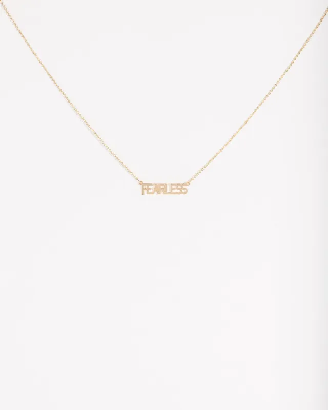 Gold Fearless Text Necklace sold by Collete Hayman