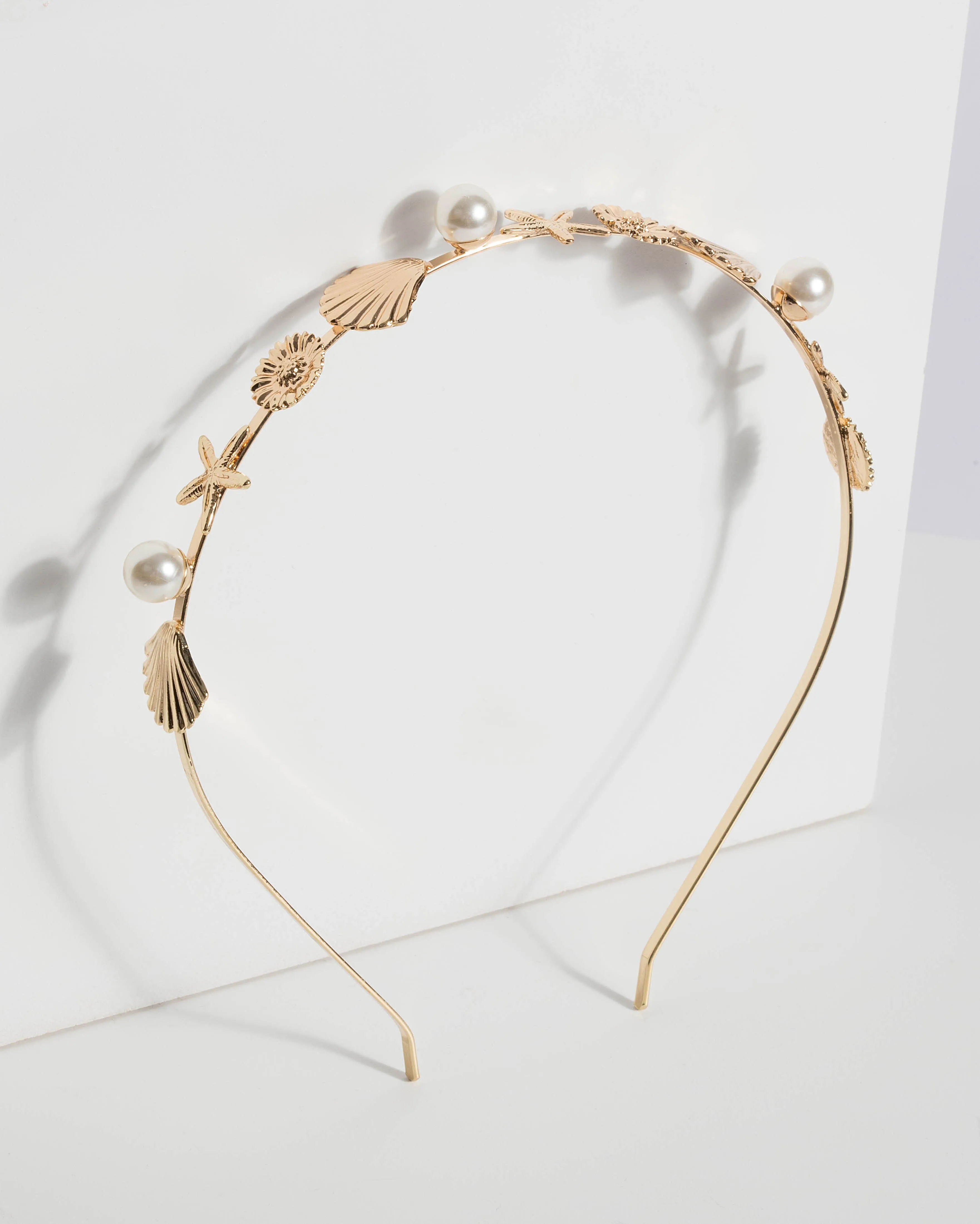 Gold Pearl and Shell Headband sold by Collete Hayman
