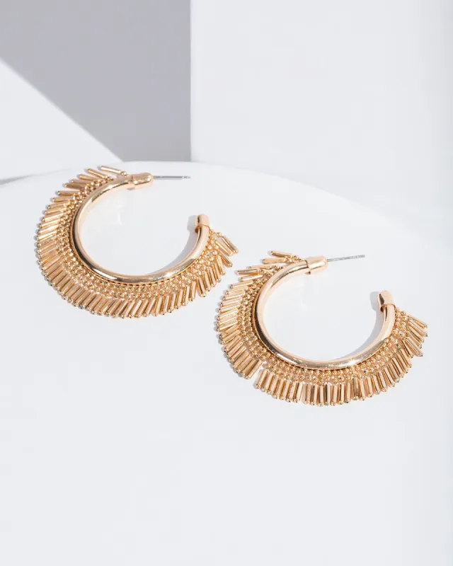 Gold Metal Tassel Statement Earrings sold by Collete Hayman
