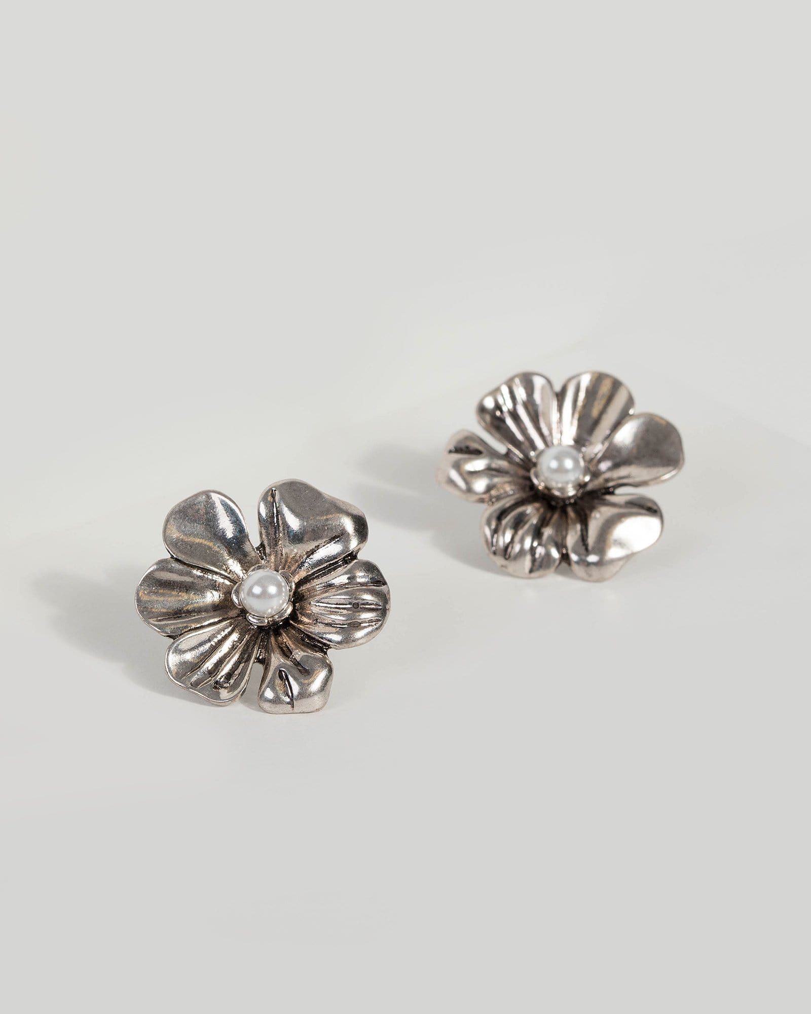 Silver Flower Stud Earrings sold by Collete Hayman
