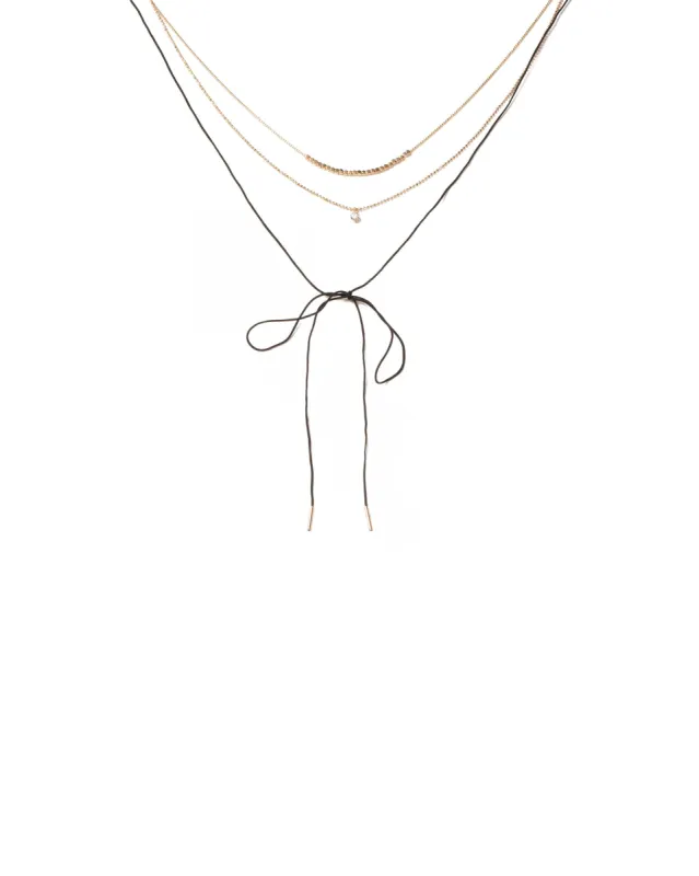 Black Gold Tone Fine Chain And Cord Necklace sold by Collete Hayman