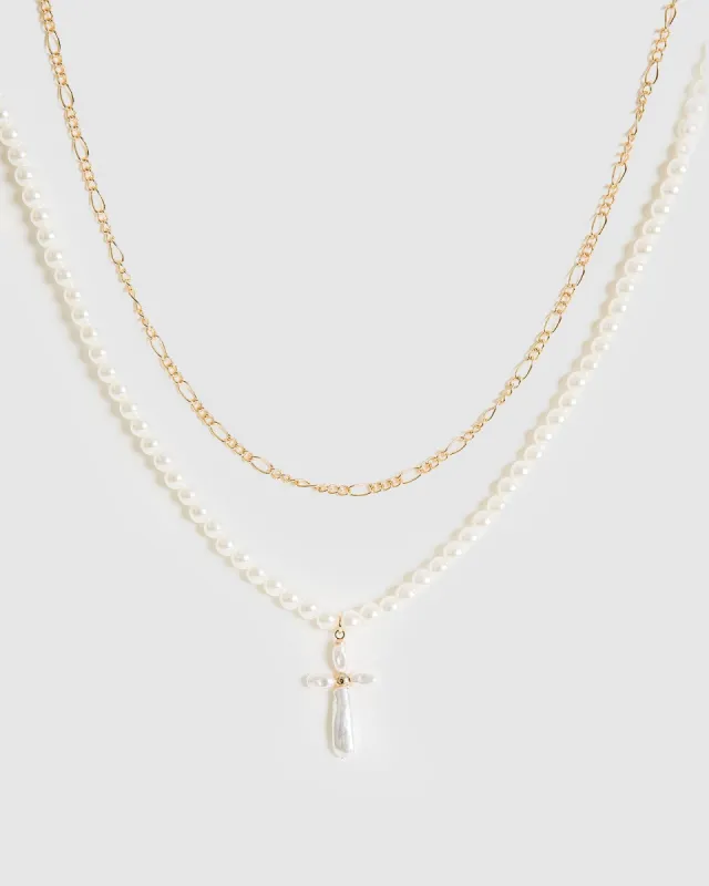 White Pearl Cross Necklace sold by Collete Hayman