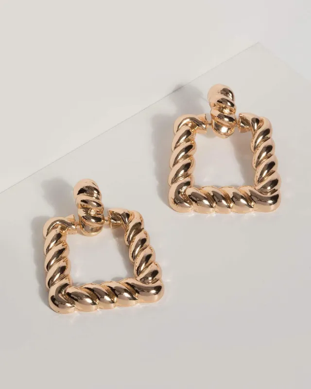 Gold Twisted Door Knocker Earrings sold by Collete Hayman