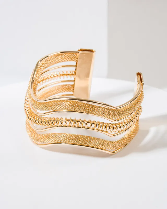 Gold Layered Wavy Bangle sold by Collete Hayman