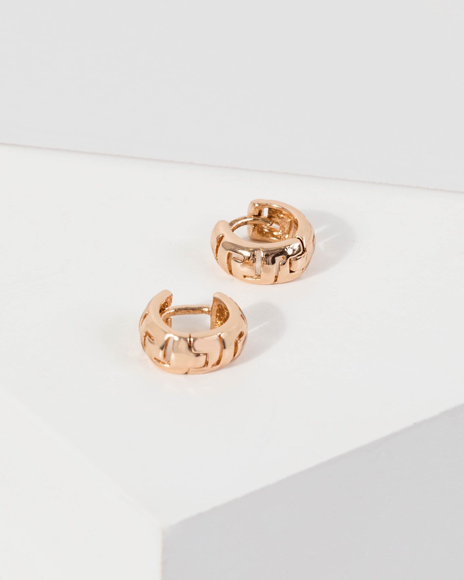 Gold Wide Huggie Hoop Earrings sold by Collete Hayman