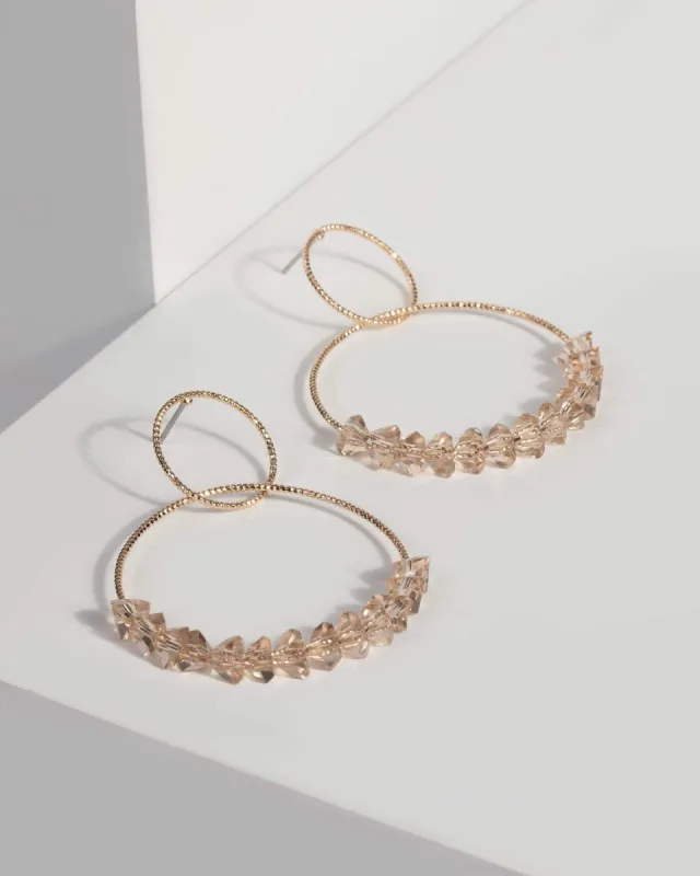 Pink Textured Circle Beaded Drop Earrings sold by Collete Hayman