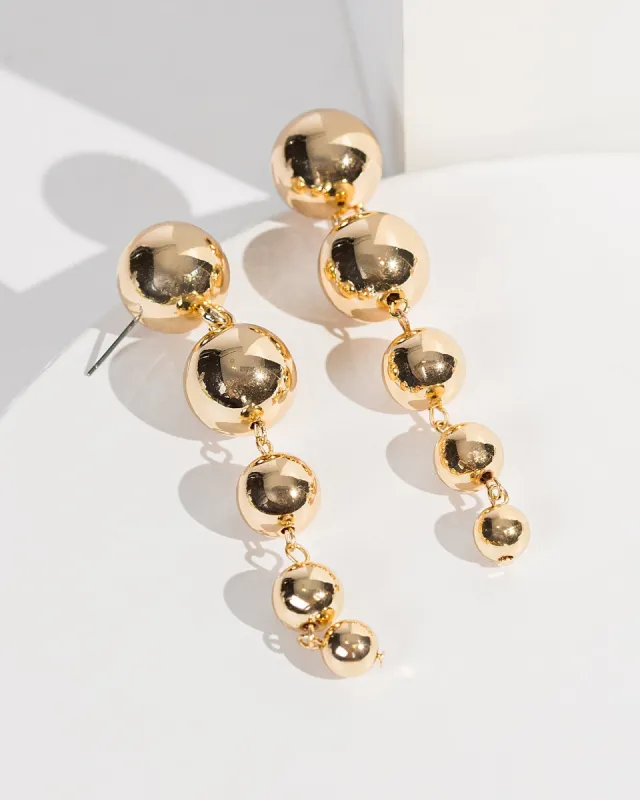 Gold Dangle Bead Studs Earrings sold by Collete Hayman