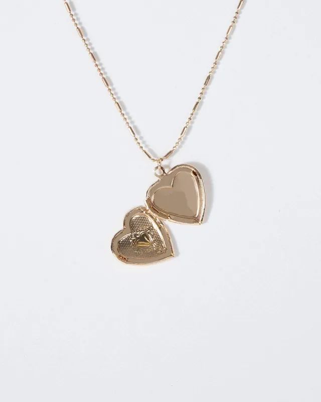 Gold Heart Locket Necklace sold by Collete Hayman