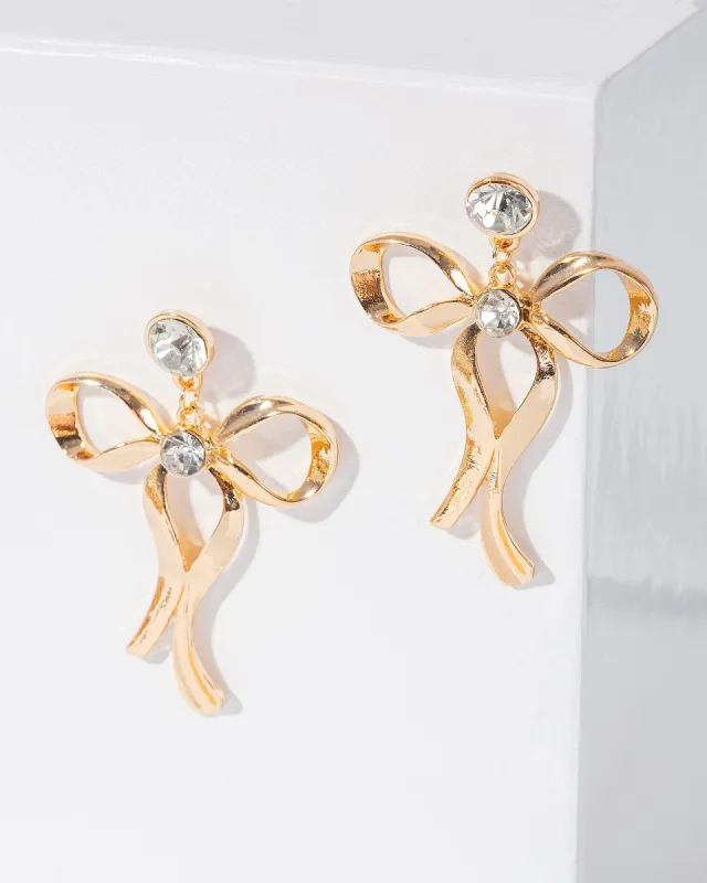 Gold Metal Bow Drop Earrings sold by Collete Hayman