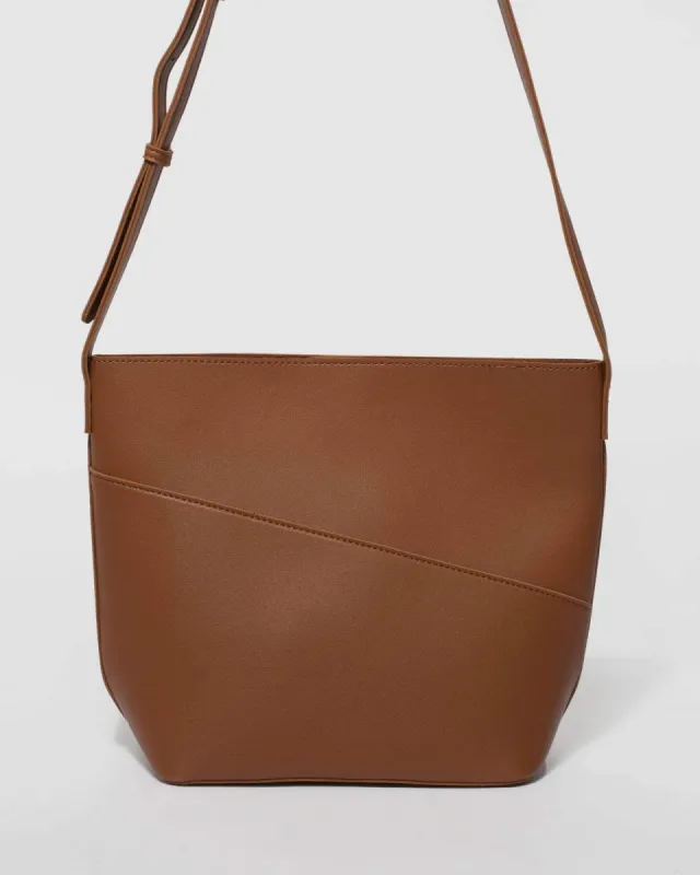 Tan Selena Pouch Crossbody Bag sold by Collete Hayman