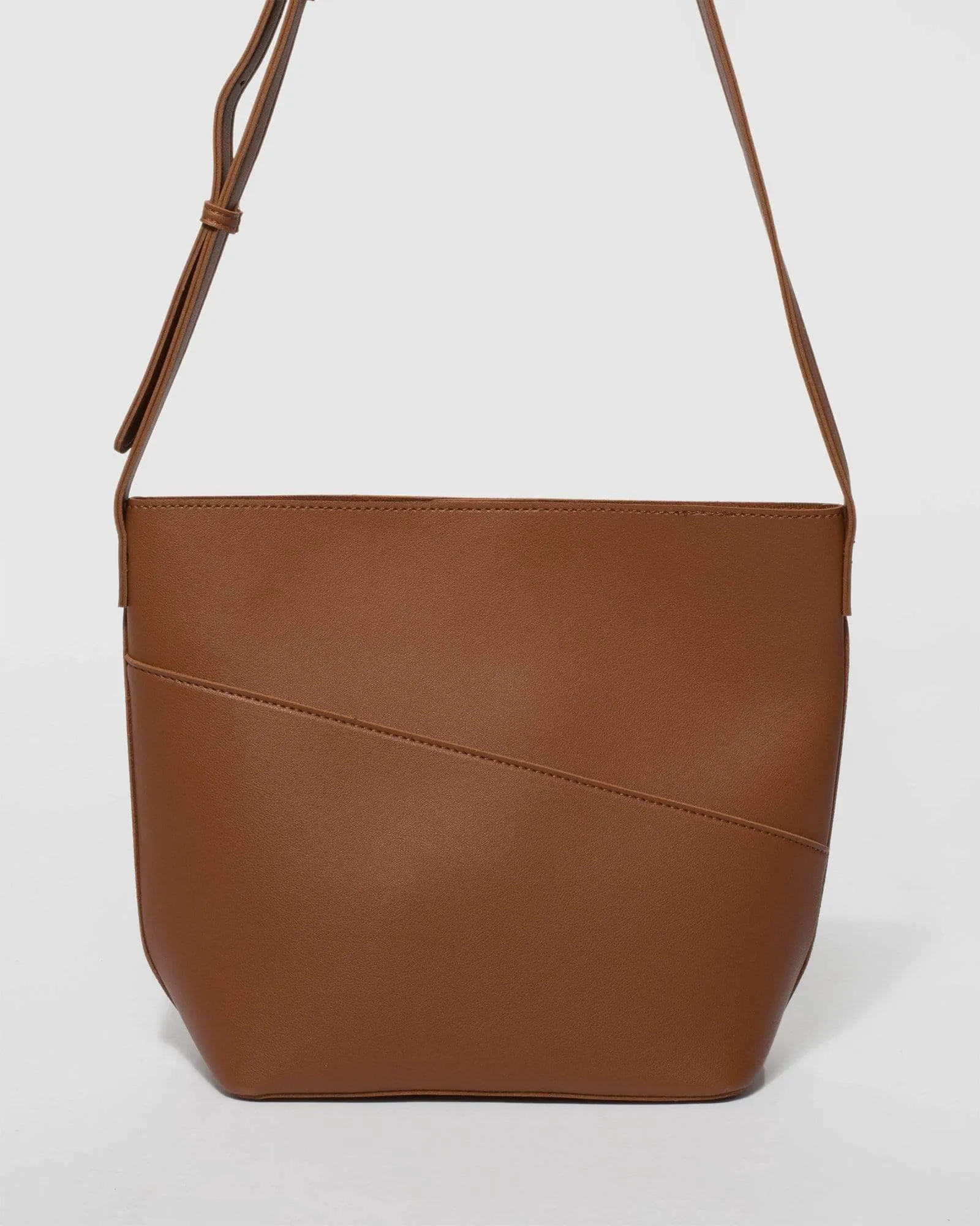 Tan Selena Pouch Crossbody Bag sold by Collete Hayman