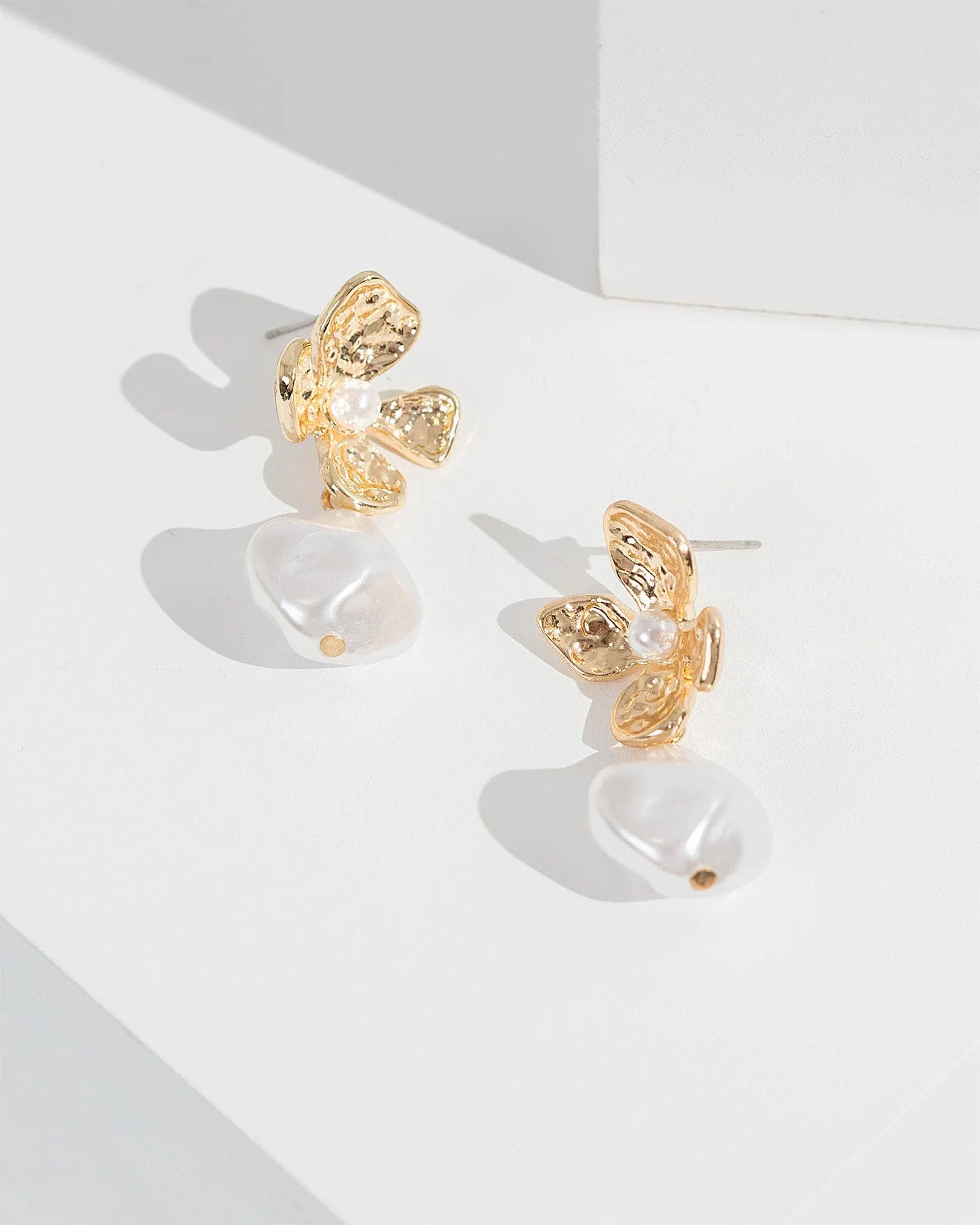 White Flower Drop Earrings sold by Collete Hayman
