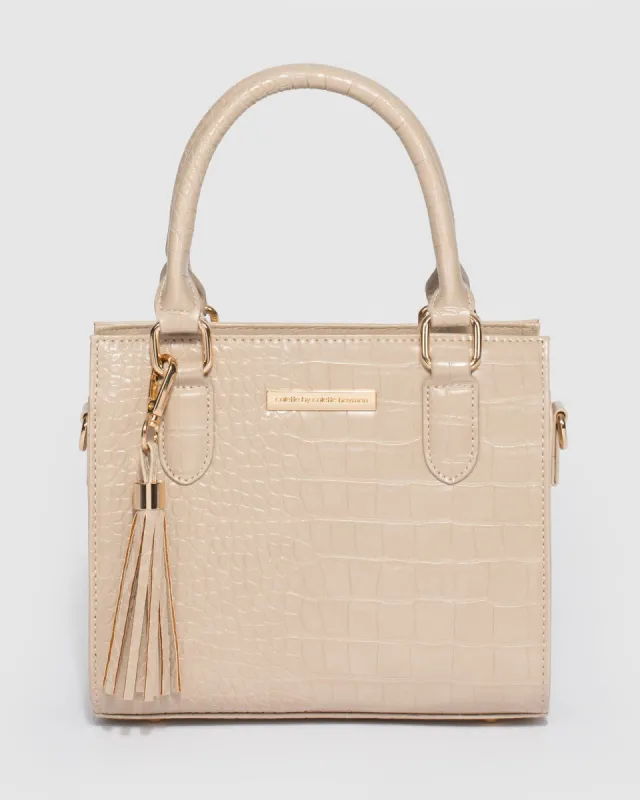 Taupe Sia Mini Tassel Tote Bag sold by Collete Hayman