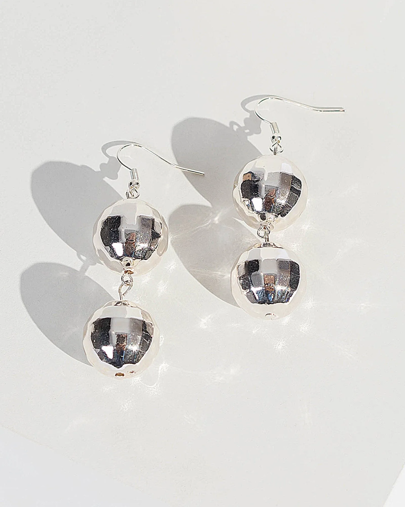 Silver Disco Ball Earrings sold by Collete Hayman