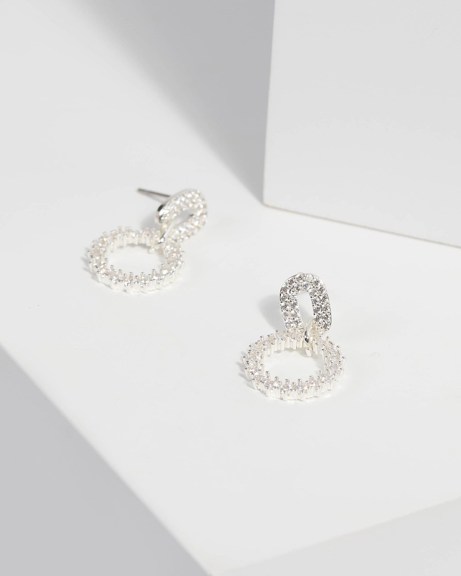 Cubic Zirconia Pave Circle Drop Earrings sold by Collete Hayman