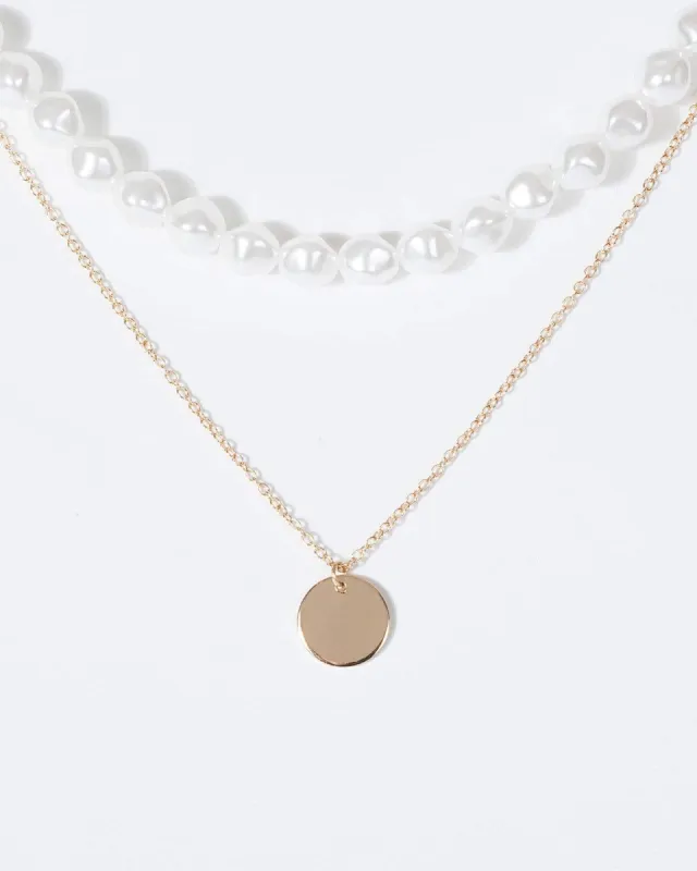 Gold Pearl And Small Circle Pendant Necklace sold by Collete Hayman