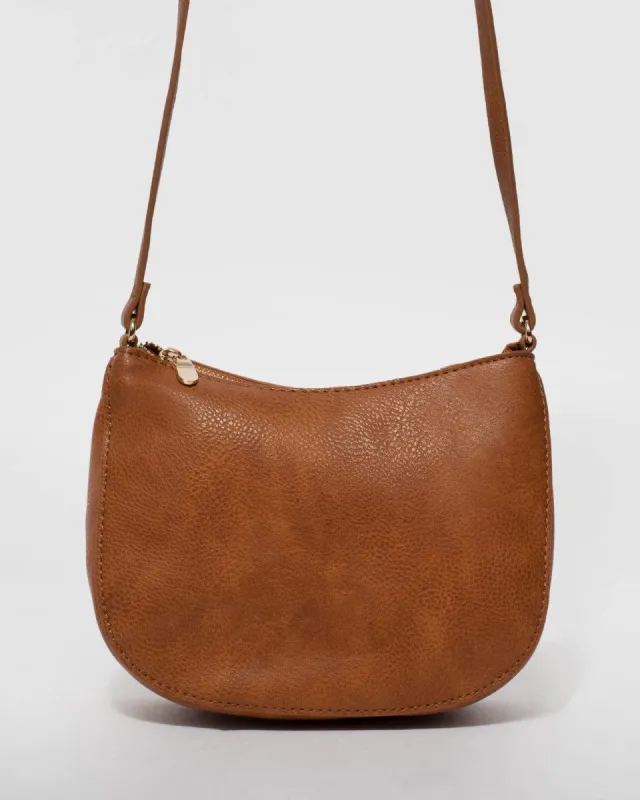 Tan Selena Saddle Crossbody Bag sold by Collete Hayman