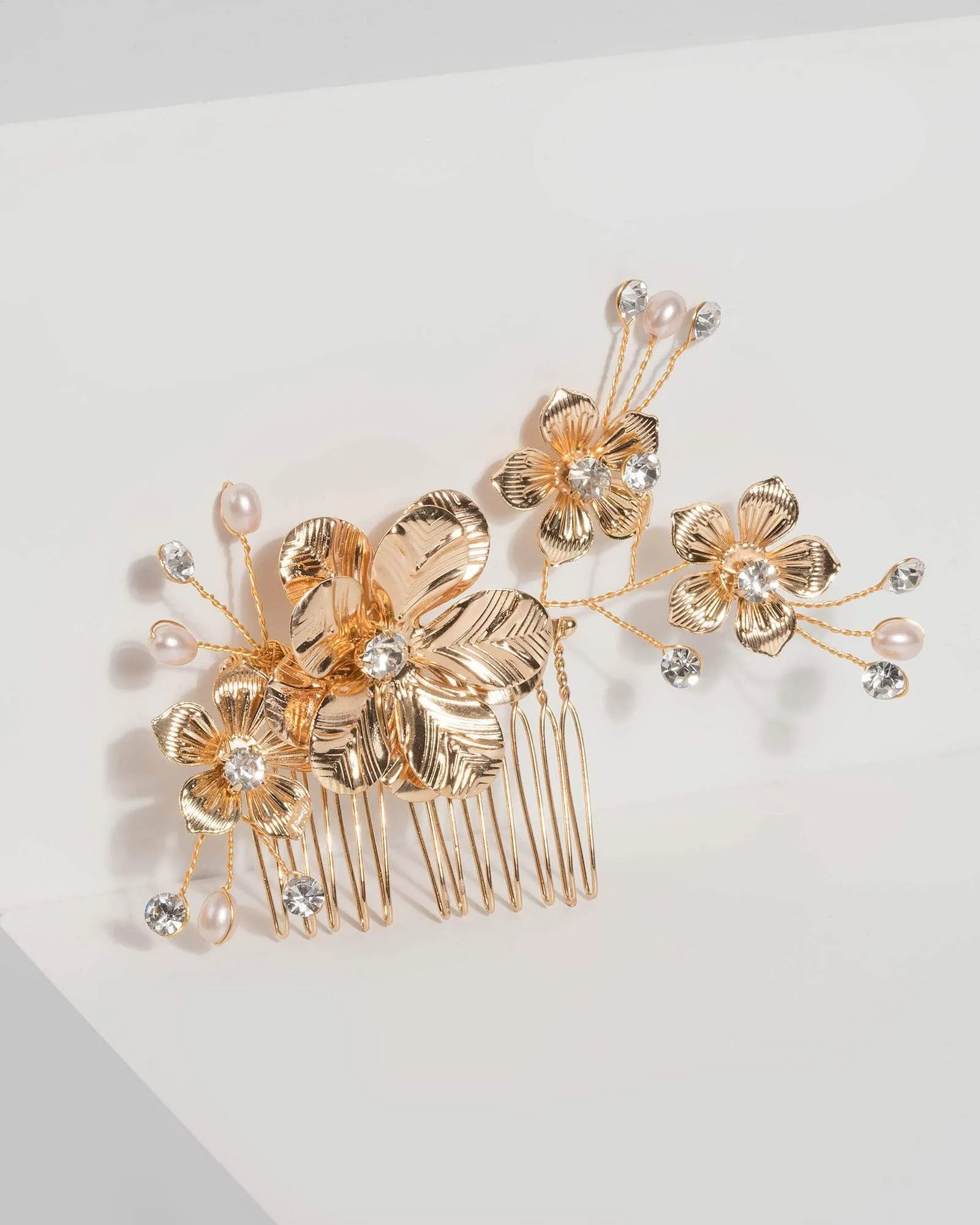 Gold Floral and Pearl Comb sold by Collete Hayman