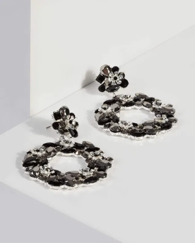 Black Crystal Encrusted Flower Drop Earrings sold by Collete Hayman