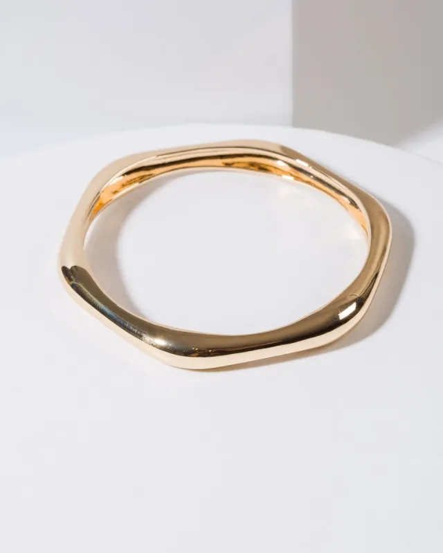 Gold Liquid Metal Bangle sold by Collete Hayman