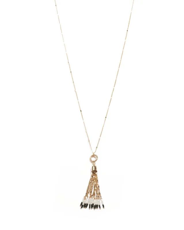 Monochrome Gold Tone Beaded Tassel Pendant On Long Necklace sold by Collete Hayman