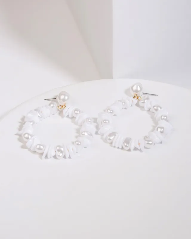 White Beaded Circle Drop Earrings sold by Collete Hayman
