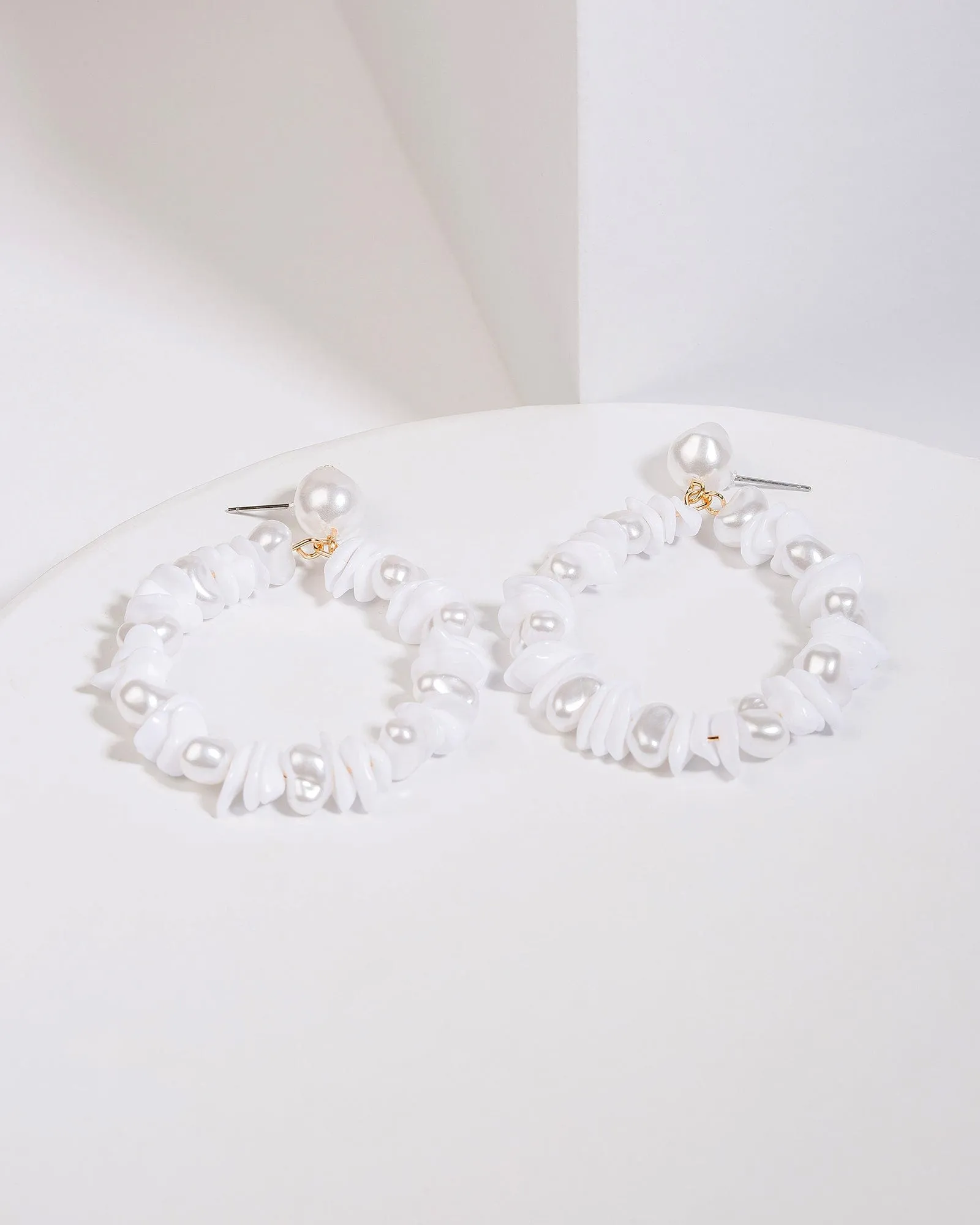White Beaded Circle Drop Earrings sold by Collete Hayman