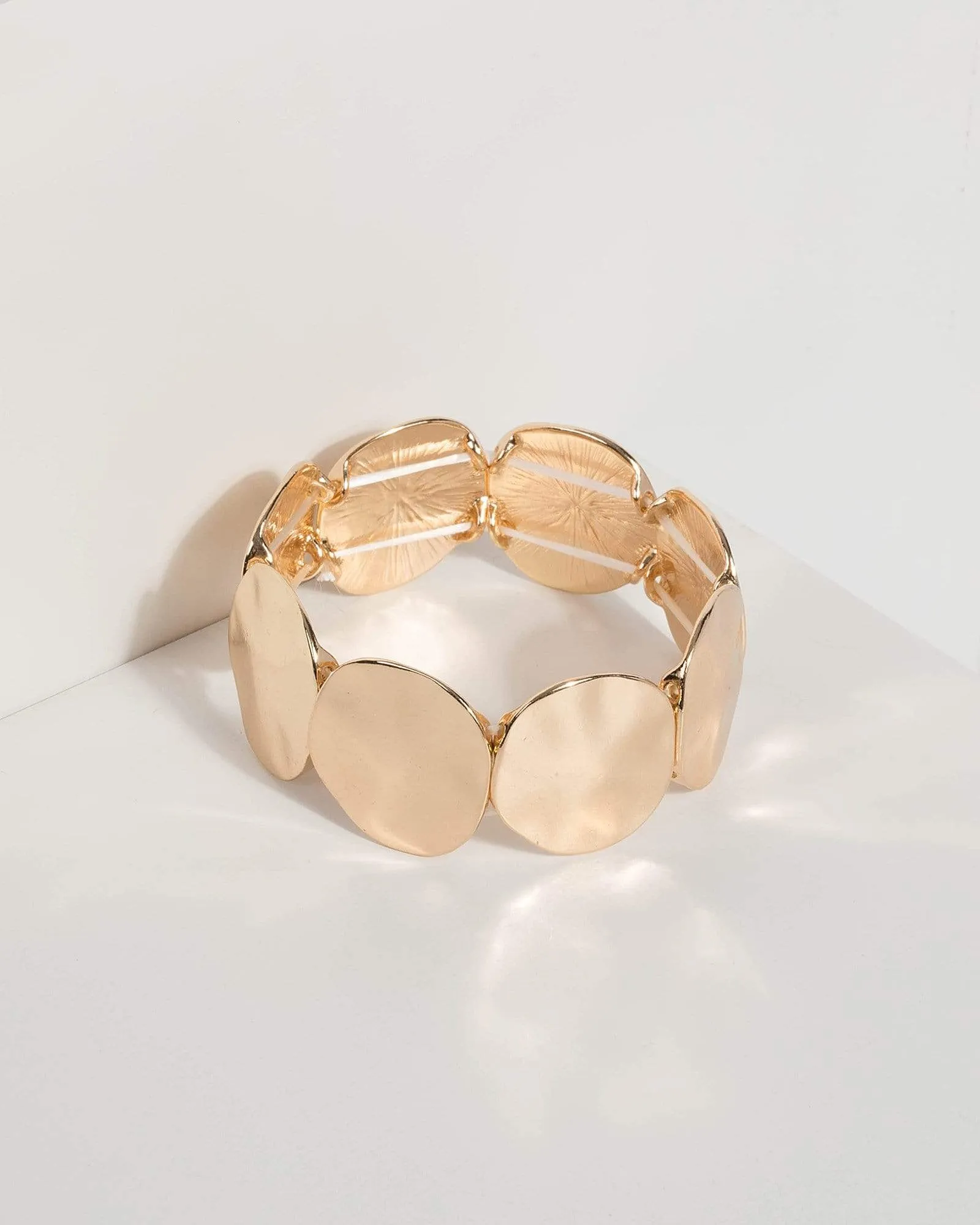 Gold Multi Disc Bracelet sold by Collete Hayman