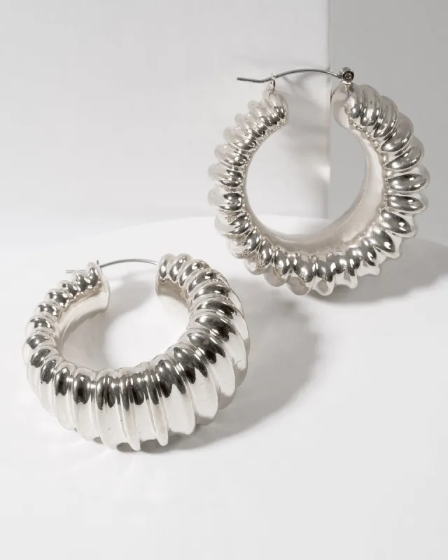Silver Textured Metal Hoop Earrings sold by Collete Hayman
